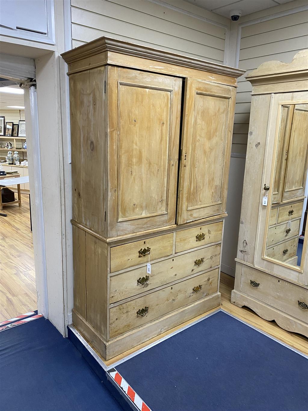 A Victorian pine linen press, length 127cm, depth 58cm, height 202cm